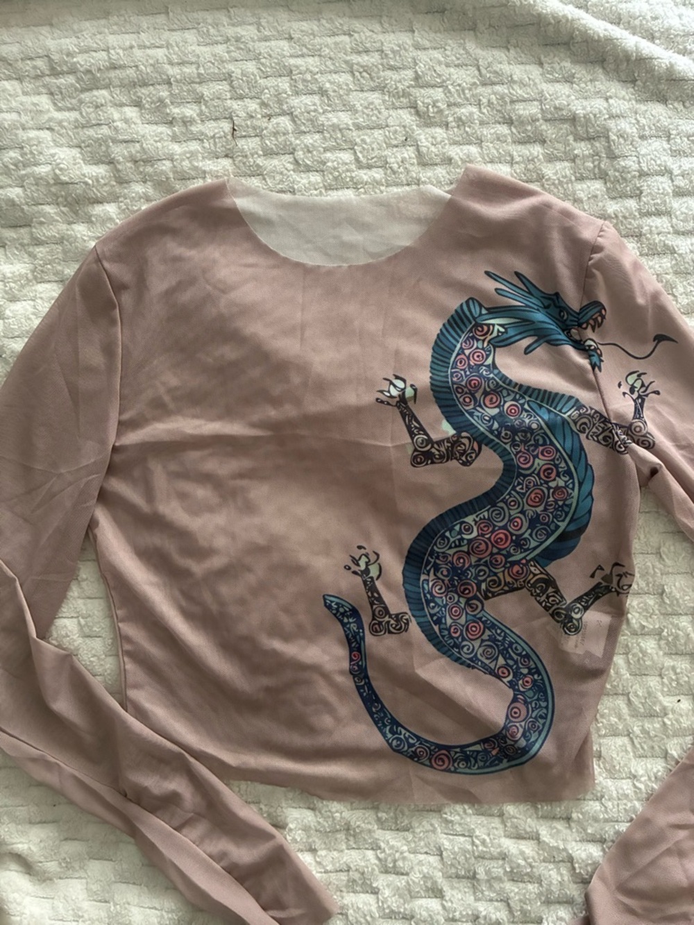 FREEBIES IN EVERY ORDER!!
NWOT Pink/tan Long Sleeve mesh top with Dragon Print
